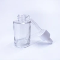 wholesale transparent matte glass cosmetic dropper bottle luxury skin care container essential oil beauty packaging