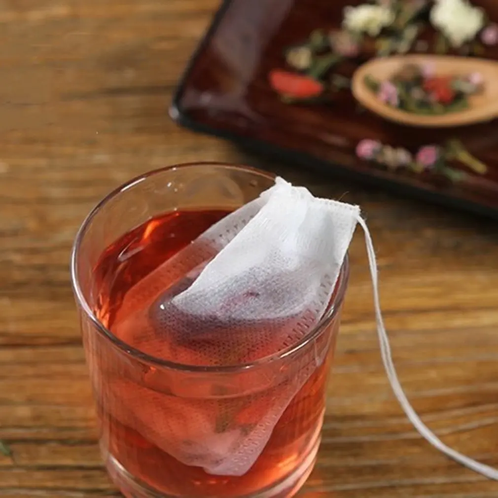 

100Pcs/Lot Teabags 5.5 X 7CM Non-Woven Fabric Empty Scented Tea Bags With String Heal Seal Filter Paper For Herb Loose Tea