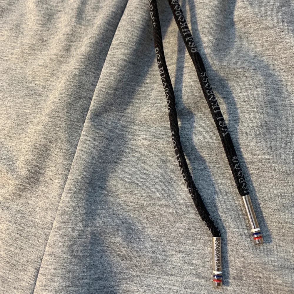 Спортивные штаны Великоросс цвета серый меланж жаккардовые лампасы и брендовые