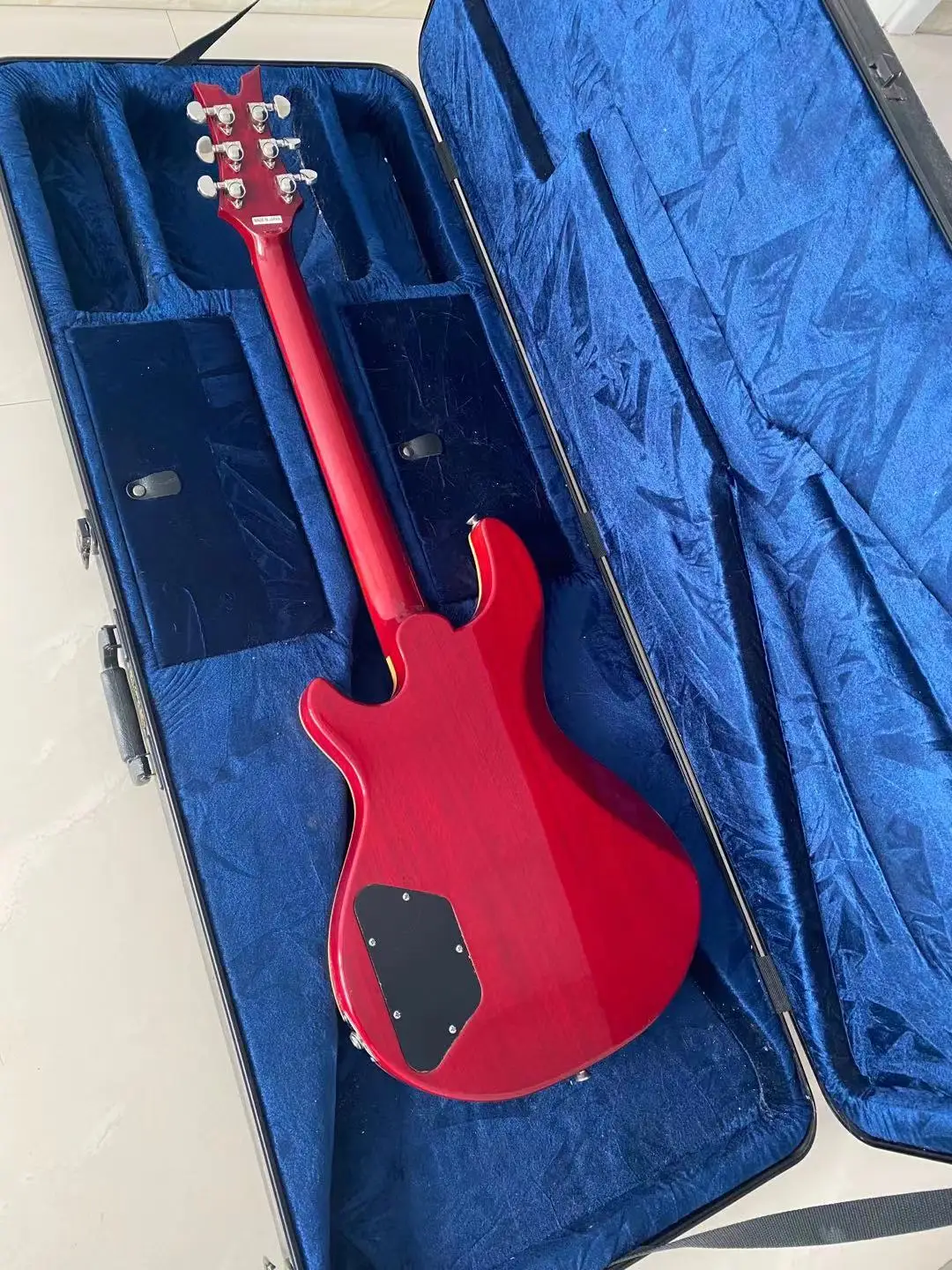 Профессиональная электрическая гитара с жестким хвостом Дина из красного дерева