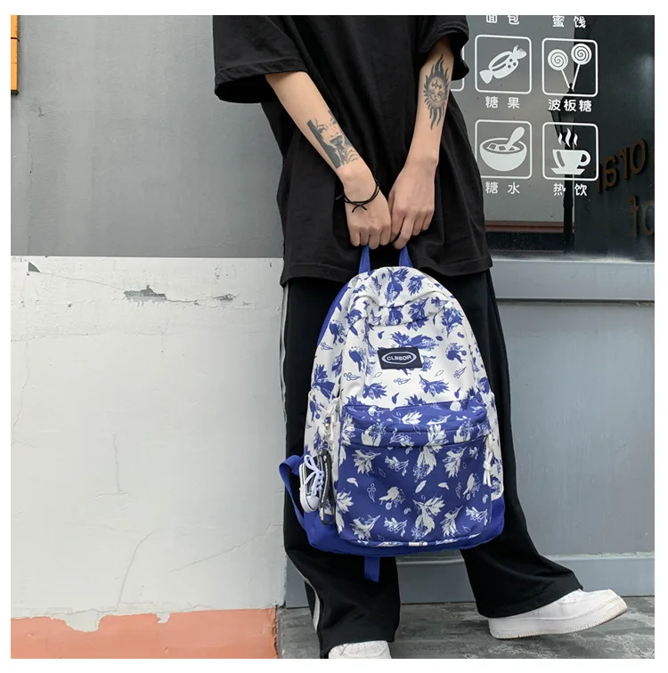 

Large capacity blue sky and white clouds backpack schoolbag for women casual women's backpack