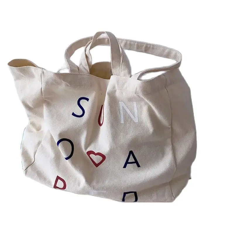 

Casual canvas bag cute girl Japanese eco-friendly bag Harajuku chic student large-capacity shoulder bag custom wholesale