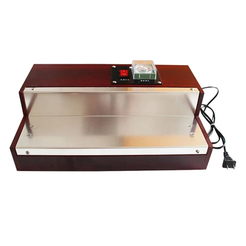 Термоусадочная машина для упаковки пленки для парфюмерной коробки, сигарет, косметики, блока игральных карт и блистерной упаковки.