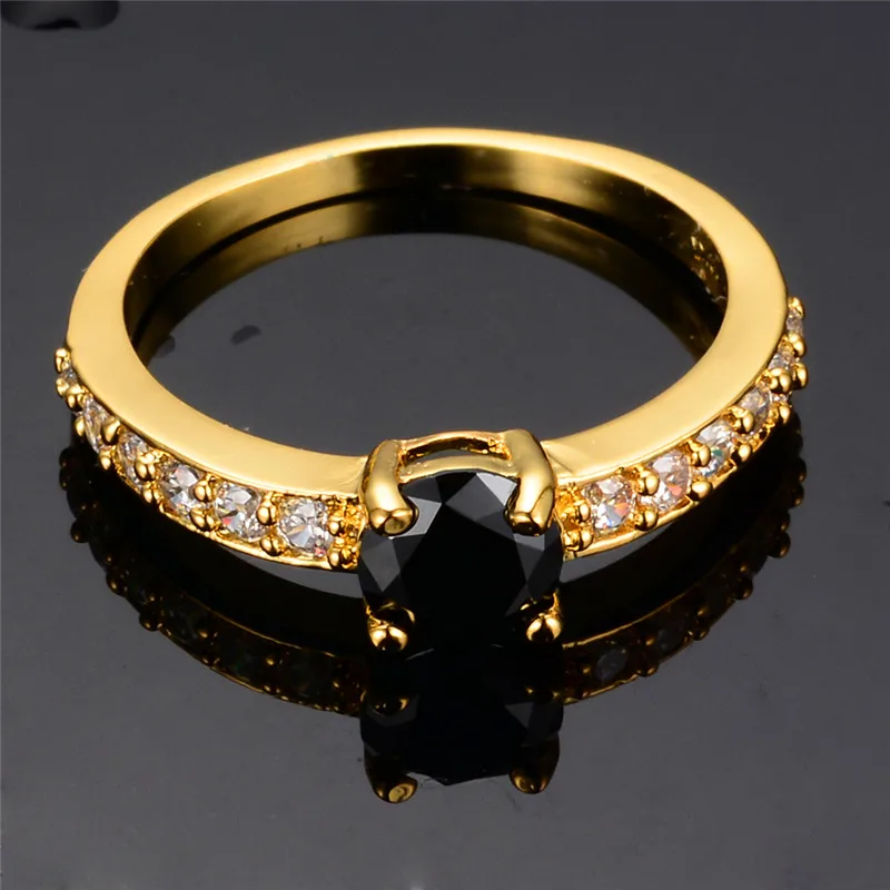 Крутое женское черное кольцо с кристаллами обручальное желтого и золотого цвета