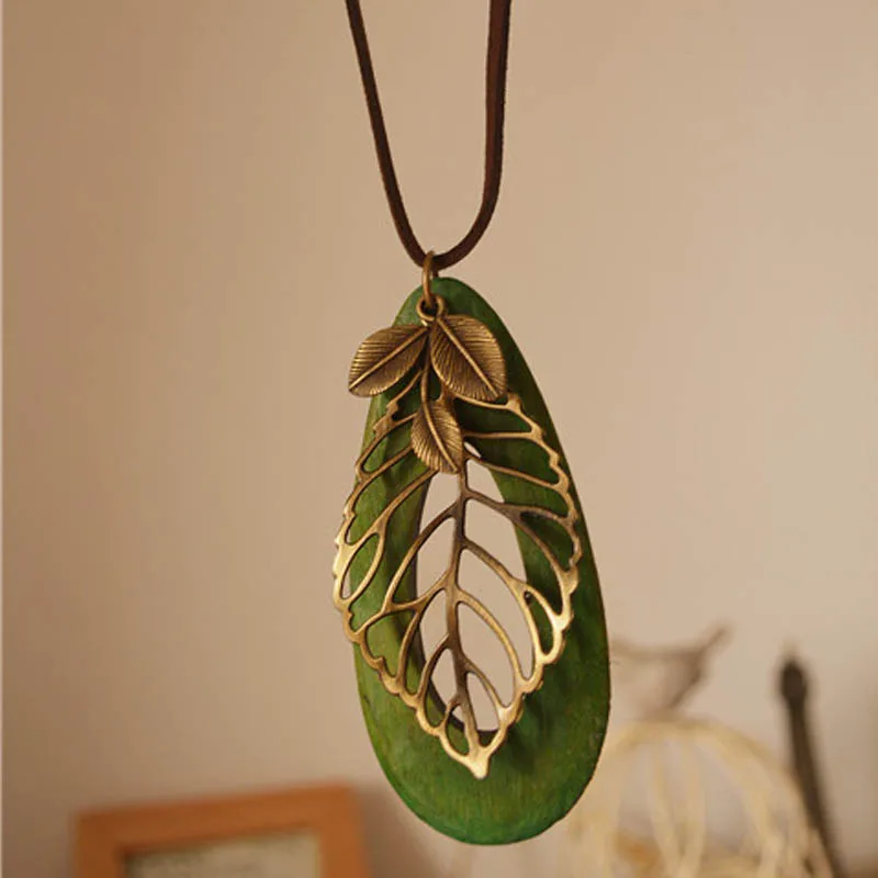 

Trendy Retro Ethnic Style Women's Necklace Simple Leaves Oval Wood Pendant Long Necklace Sweater Chain for Woman Charm Jewelry