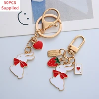 50pcs new cute rabbit love keychain creative bow ribbon for woman car pendant cute bag pendant jewelry keyring accessories