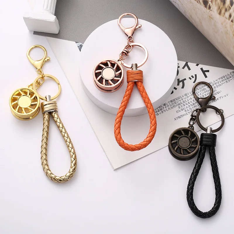 

Trending European andAmerican Fashion Aromatherapy Keychain Stainless Steel Essential Oil Pendant Men's andWomen's Bag Ornaments