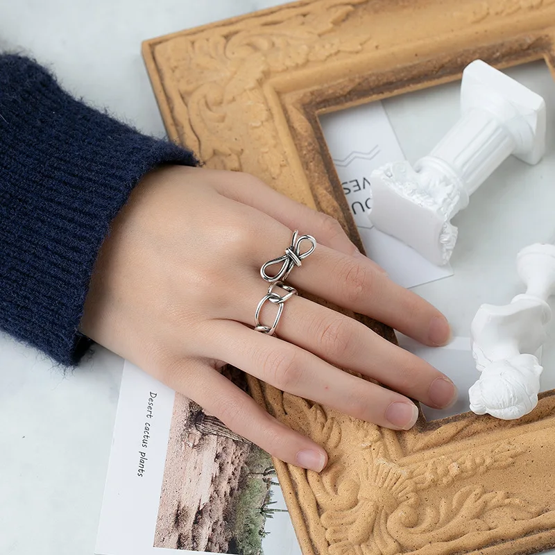 

MEYRROYU Sterling Silver New Trendy Geometric Bow Hollow Ring For Women Temperament Sweet Simple Jewelry Friends Party Andywen