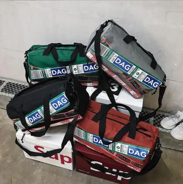Travel bag large capacity men and women hand luggage bag female hip hop tide travel sports training fitness bag
