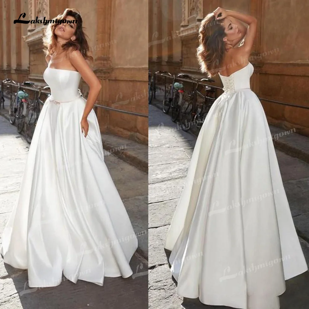 

Simple Satin A-Line Wedding Dresses Strapless Neck Sleeveless Lace Up Sweep/Brush Train Bride Gowns Off The Shoulder Sashes