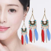 2021 new creative ethnic style ladies mixed color feather earrings bohemian fan shaped dripping rice beads color retro earrings
