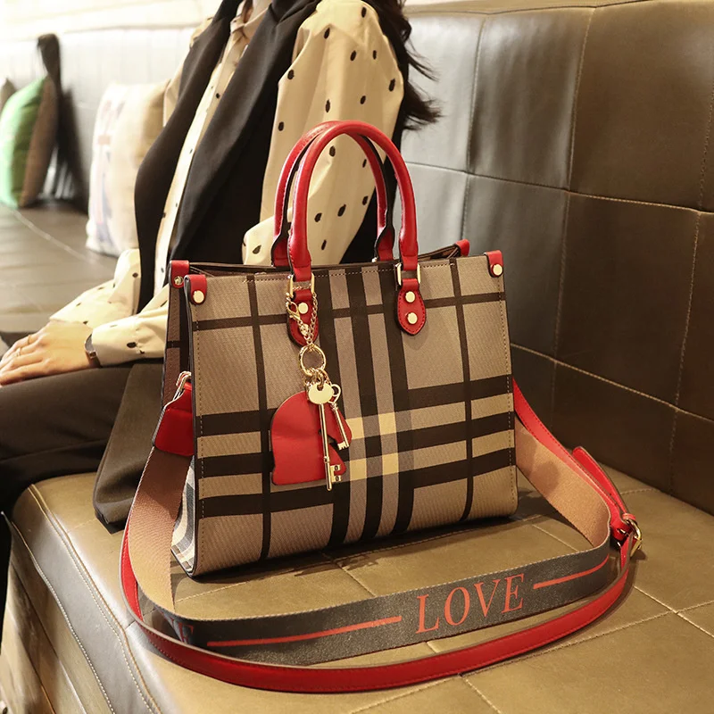 

Hong Kong Leather Women's bag 2021 new trend versatile atmosphere check official document tote bag hand bill of lading shoulder