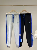 korean version of the spring and autumn ader error sports pants for men and women loose casual autumn running straight trousers