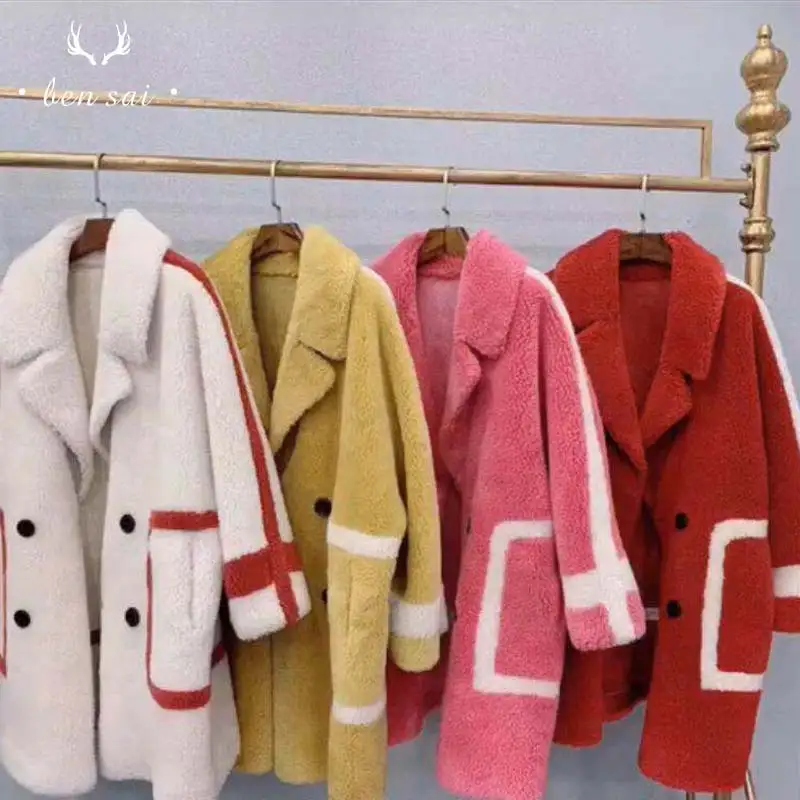 Модное женское кожаное меховое пальто длинное двубортное с карманами и