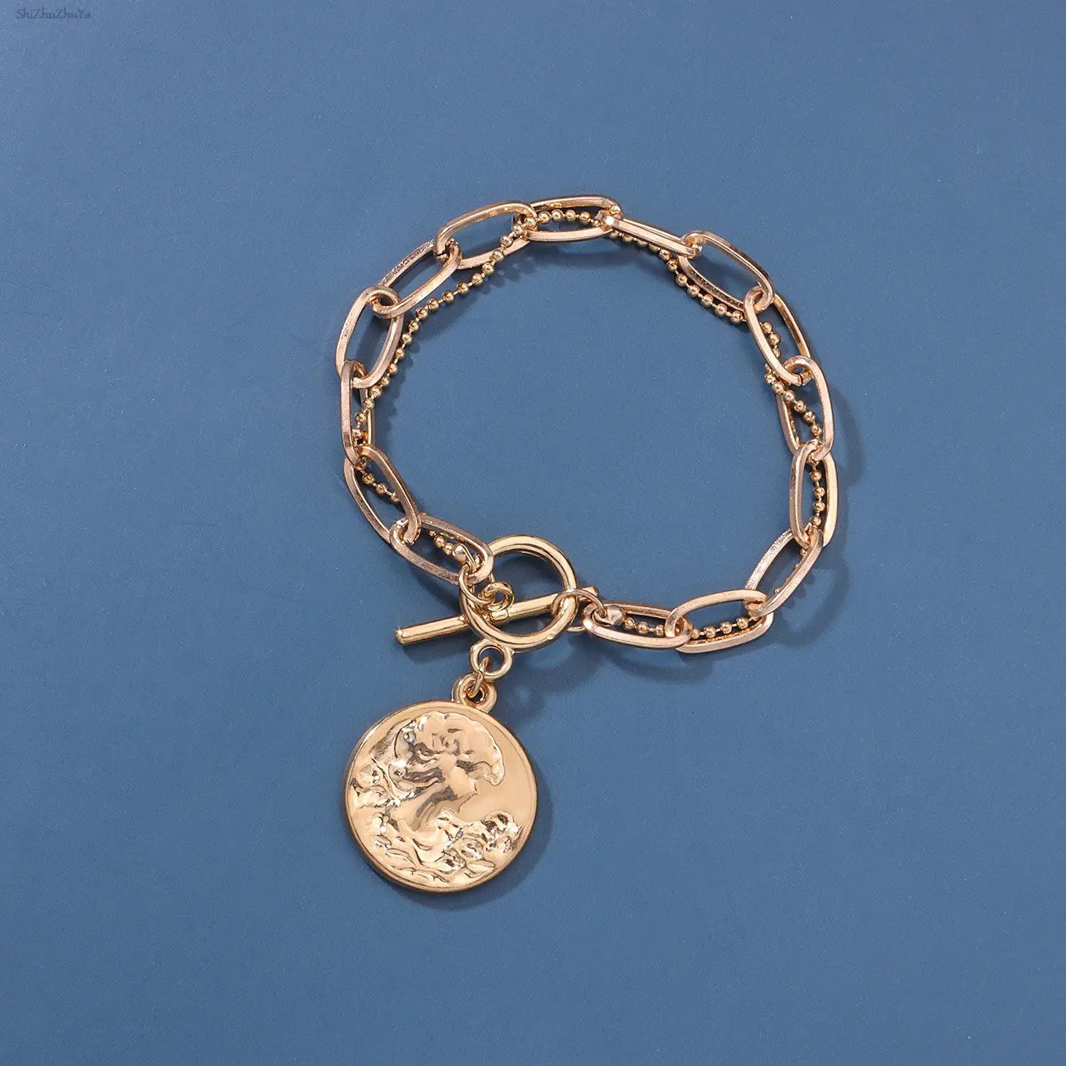 

Simple multi-layer handmade embossed portrait bracelet retro creative personality OT buckle thick chain ladies party jewelry