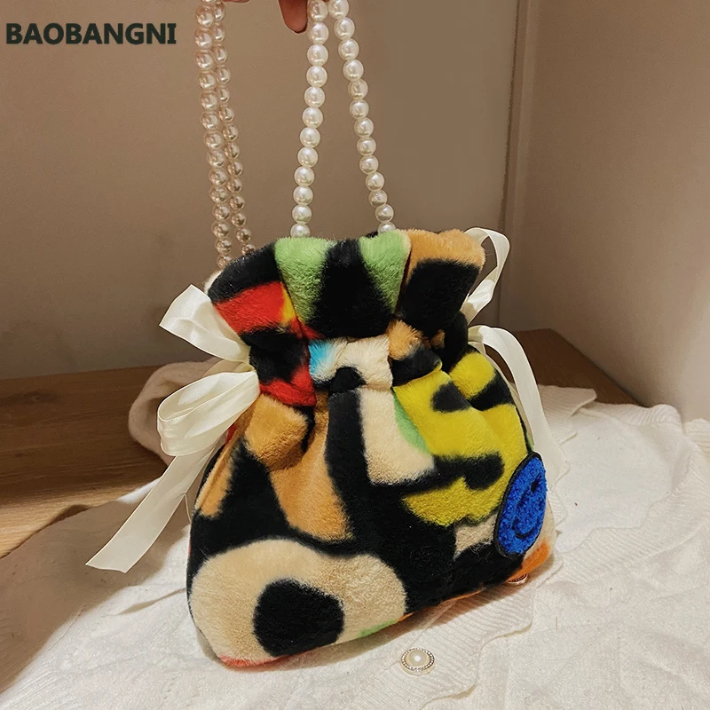 

Plush Faux Fur Drawstring Bucket Shoulder Bag for Women Winter Hit Small Crossbody Bag Designer Handbags and Purses