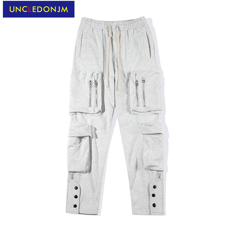 

UNCLEDONJM Multi pocket jogger sweatpants men High Street fashion track pants men trousers casual streetwear stacked sweatpants