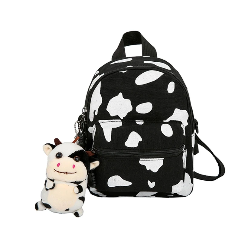 

Mini Canvas Daypack with Plush Pendant Cow Print Backpack for Women Lady Girls