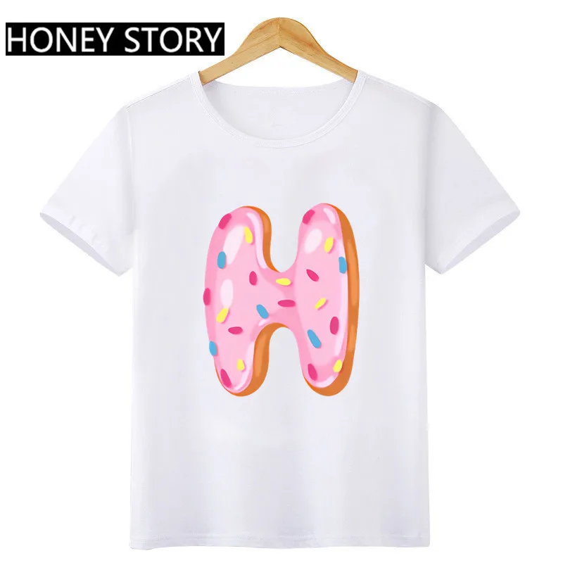 

Повседневные забавные детские футболки, Новое поступление, Милая футболка с 26 буквенным принтом пончиков для маленьких девочек, одежда для ...