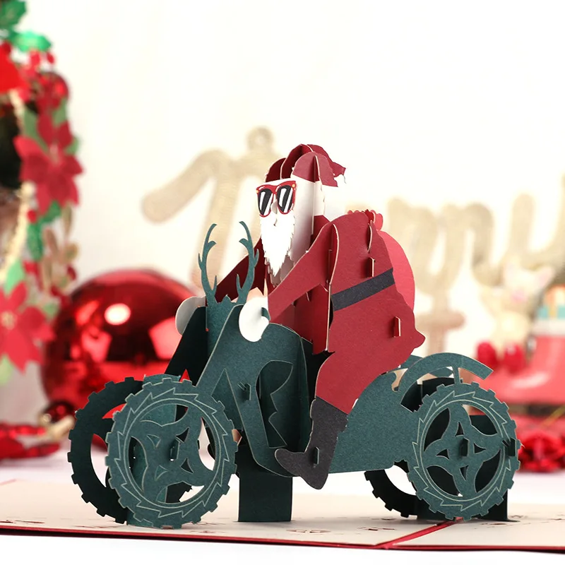 Рождественская поздравительная открытка Санта-Клаус на мотоцикле креативная