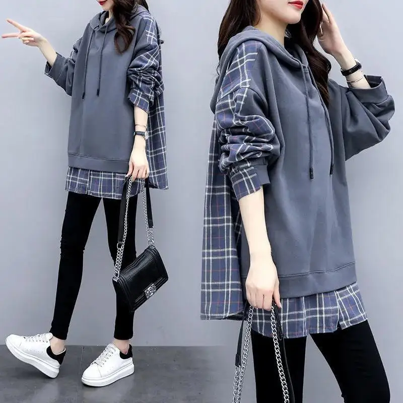 

Cotton spring and autumn women's Korean leisure stitching loose long fake two-piece hooded fashion thin sweater.