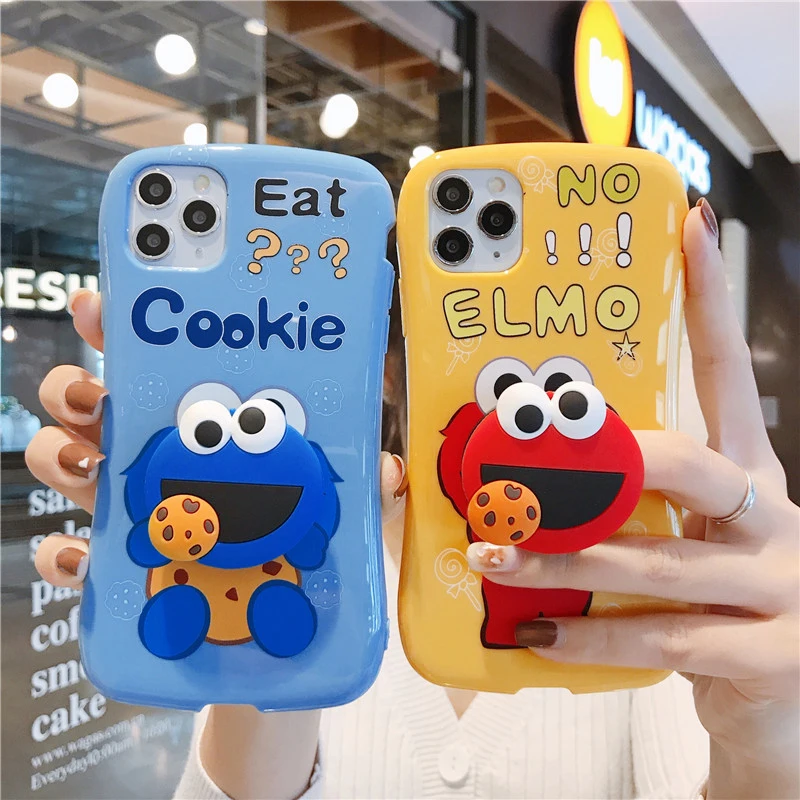 

Korea Cartoon Cute Eating Cookies Sesame Street 3D Doll Handle Bracket Soft Phone Case for Iphone 11Por MAX XS XR 7 8plus Cover