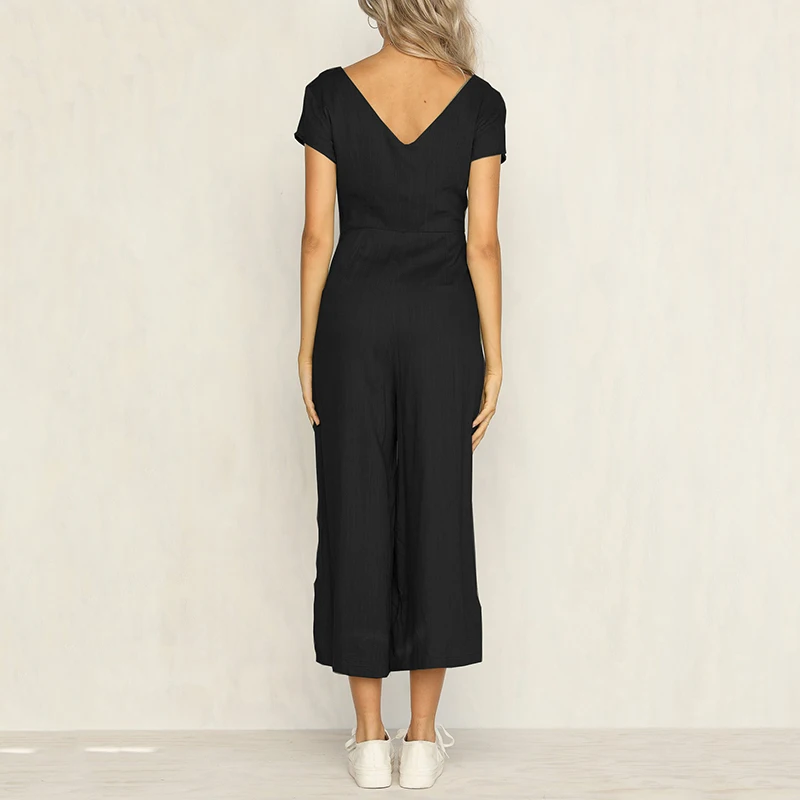 Женский комбинезон с коротким рукавом черный свободный V образным вырезом и