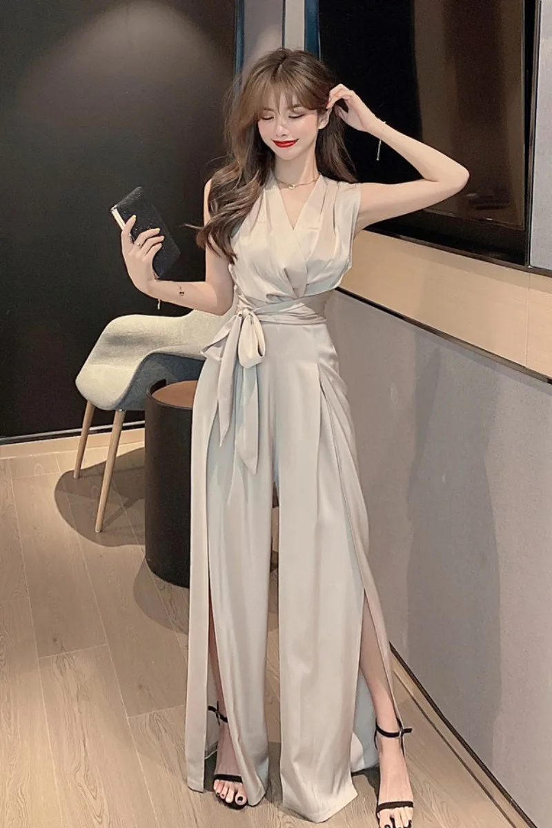 

2021 New Summer Fashion Temperament Slim Waist Bandage Split One-Piece Jumpsuit Women V-neck Sleeveless Casual Wide Leg Rompers