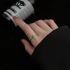Кольцо женское из серебра 925 пробы с зеленым кристаллом и цирконием