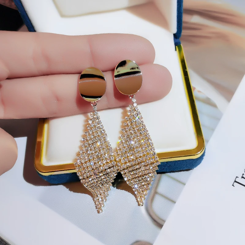

Cold wind euramerican style temperament long tassel shows face thin earring of Han edition individual character joker ear stud