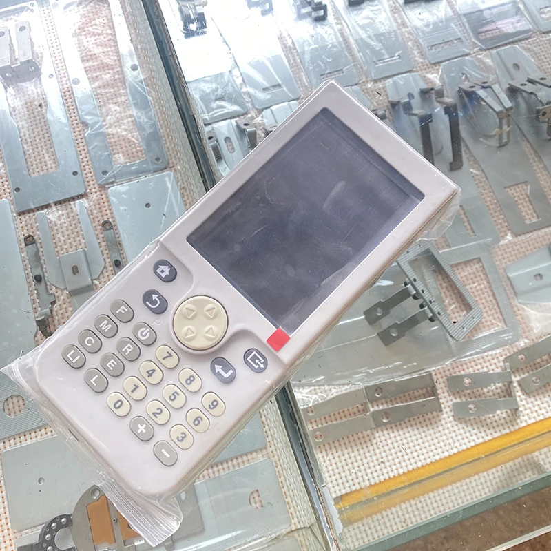 

Brother electronic pattern sewing BAS-311G 326H 311HN HANDHELD PROGRAMMER ASSY