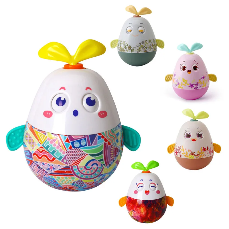 

Игрушка-неваляшка в виде кролика с музыкальной шкатулкой и колокольчиком