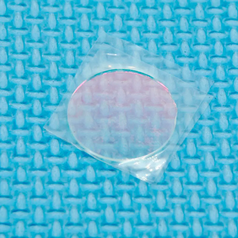 Рисунок 3 - Стеклянная линза с фильтром диаметром