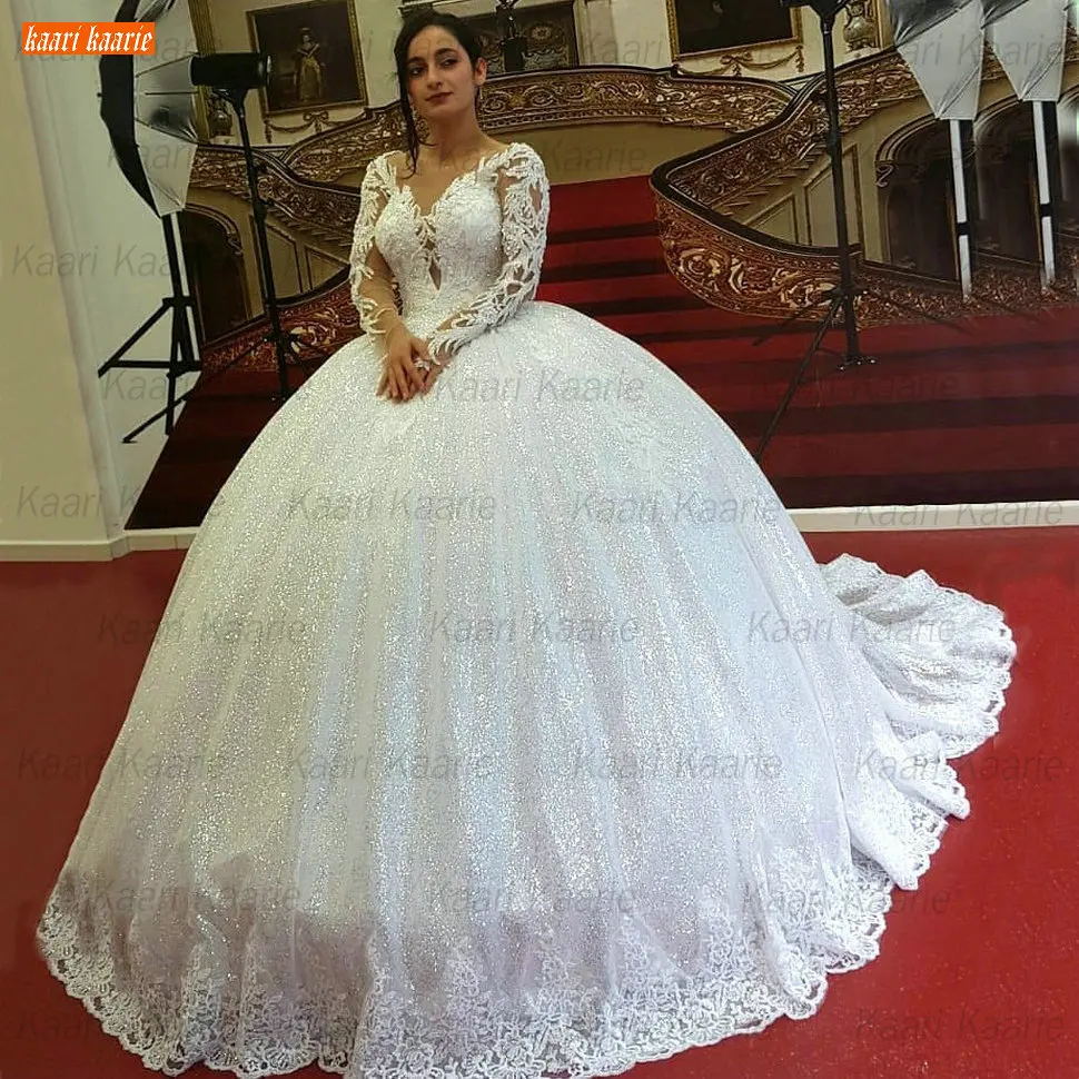 

Glitter White Wedding Dresses Long Sleeves 2021 vestido de noiva O Neck Backless Bridal Gown Lace Appliqus Beading suknia slubna