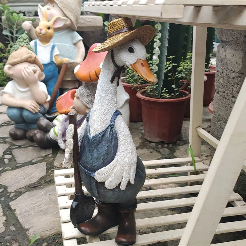 

Cute Resin Duck Outdoor Statue Flexible Simulation Duck Ornaments For Outdoor Yard Lawn Garden Decorations YG