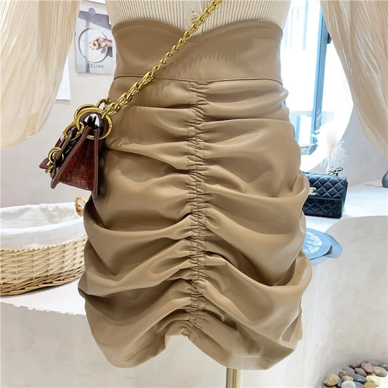 

Плиссированная юбка ZCSMLL из искусственной кожи для женщин, Новинка осени 2021, тонкая универсальная короткая женская юбка на бедрах с высокой ...