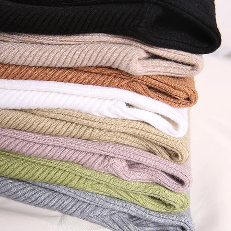 Женский свитер с воротником-хомутом вязаный высоким эластичным поясом