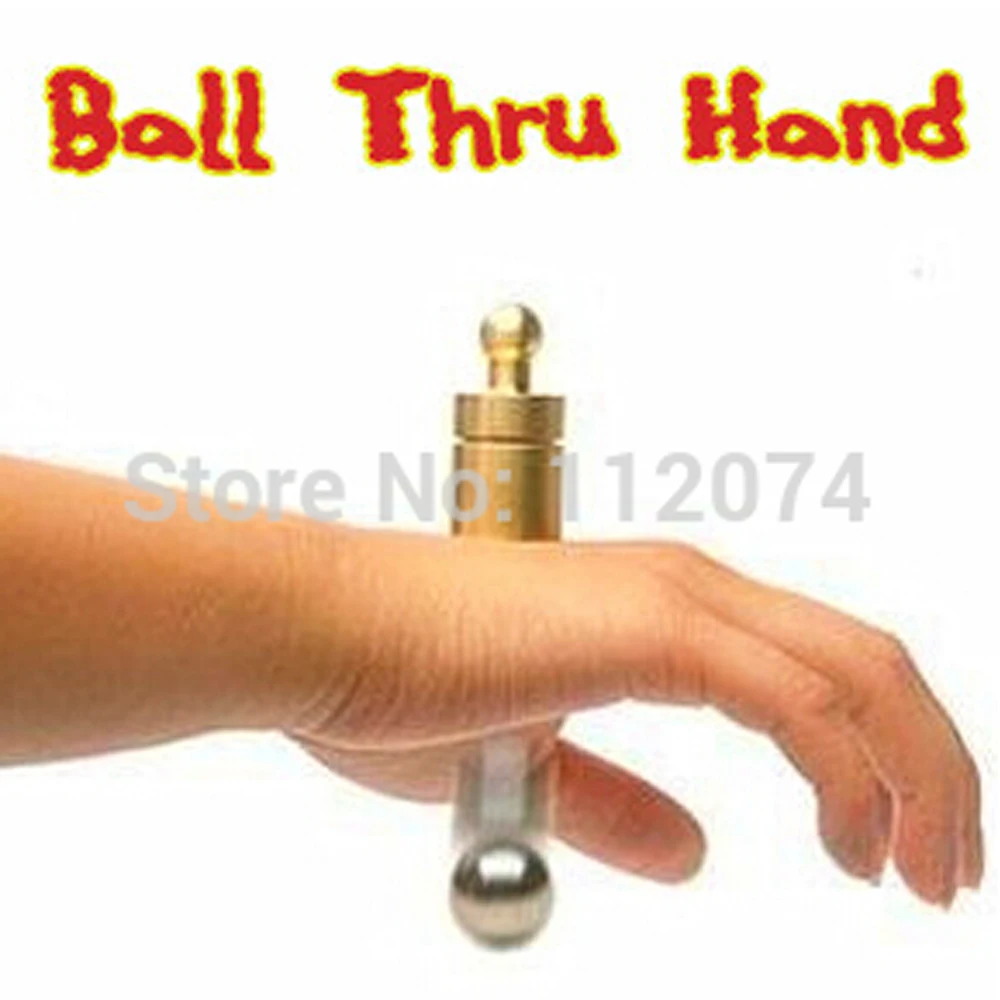 Стальной шар через руку волшебные трюки сцена крупным планом Волшебная трубка