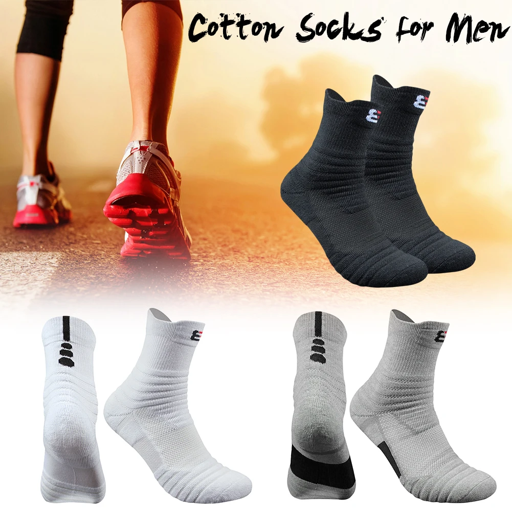 

A pair of Basketball Socks Man Long Thickening Towel Bottom Cotton Socks Outdoors Run Badminton Tennis Sport Socks Black white
