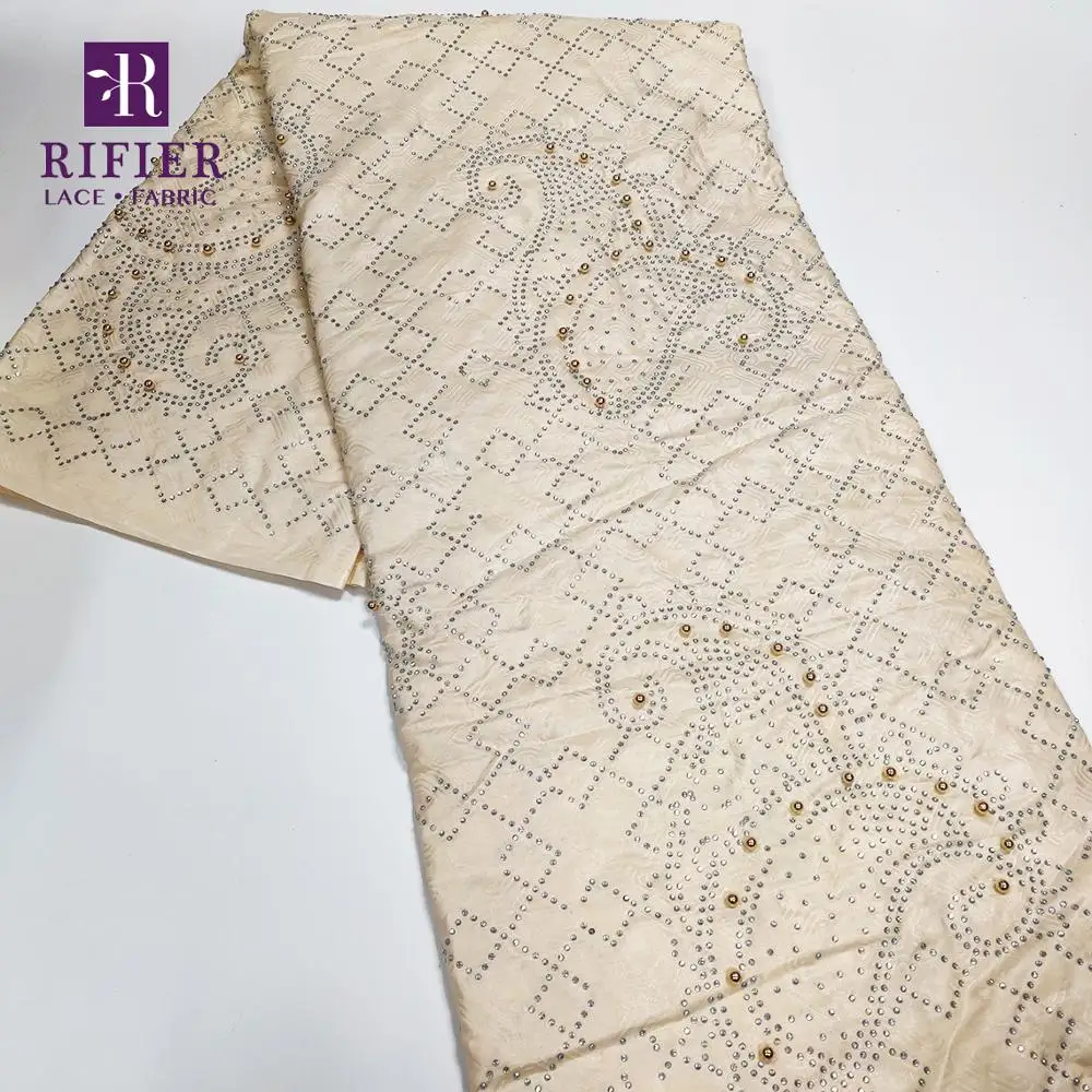 

Beige Color Bazin Riche Lace Farbrics With Beads And Stones African Nigerian Jacquard Style Guinea Lagos Women Noble Basin Laces