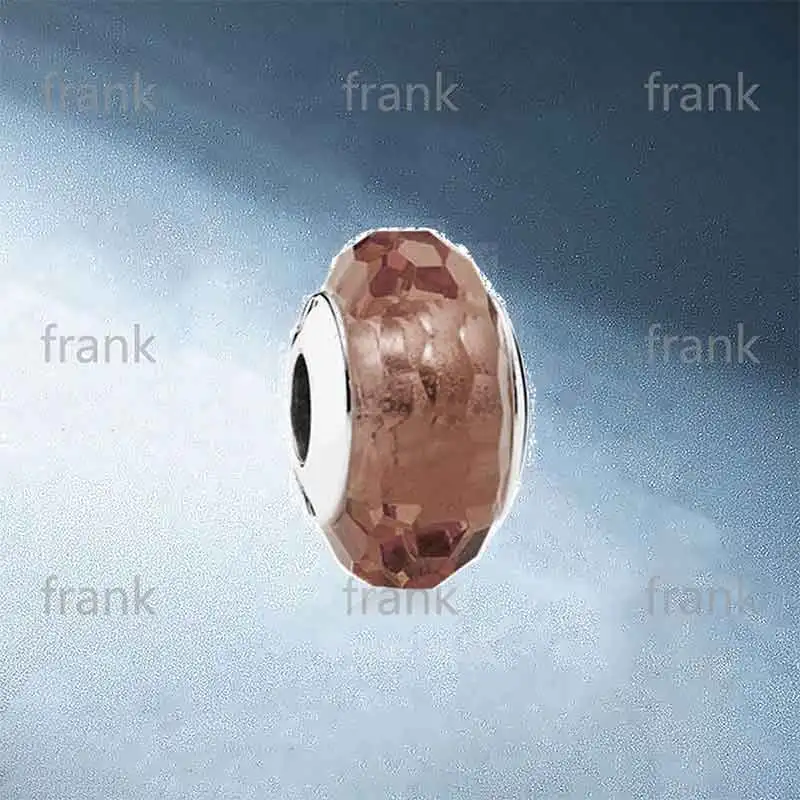 

Abstract-faceted-silver-charm-with-brown-coloured-Murano-glass