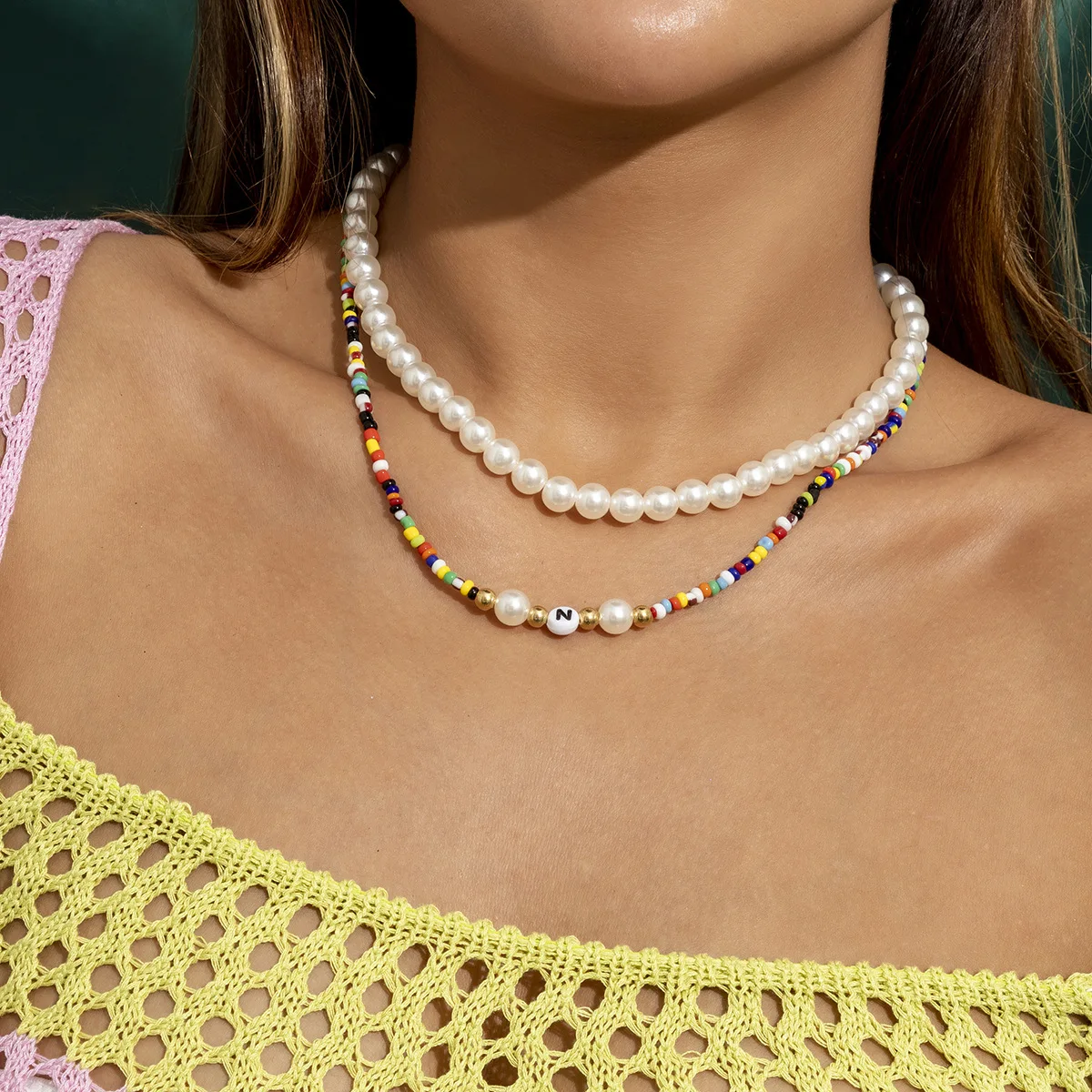 

Autumn New Jewelry Holiday Style Mix And Match Rice Bead Woven Contrast Color Necklace Imitation Pearl Eye Suit Letter Necklace