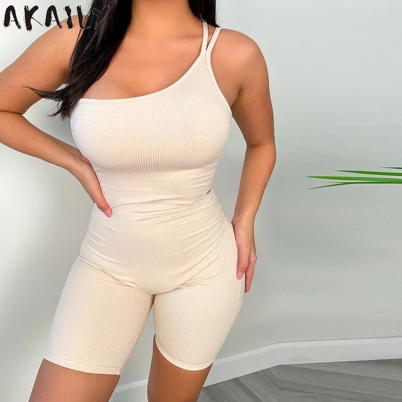 

Akaily Summer Black Backless Rompers Women Jumpsuit White One Shoulder Bodycon Short Jumpsuit Women One Piece Outfit Women 2021