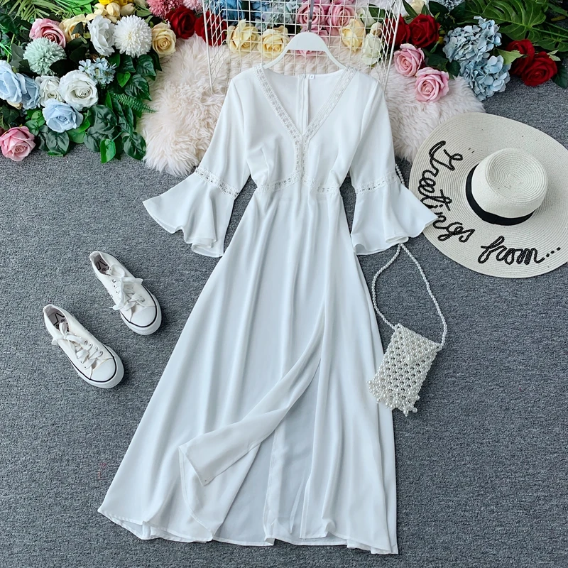 

STARK white red island of phuket trip taken beach dress female temperament of seaside holiday dresses v-neck split red dress