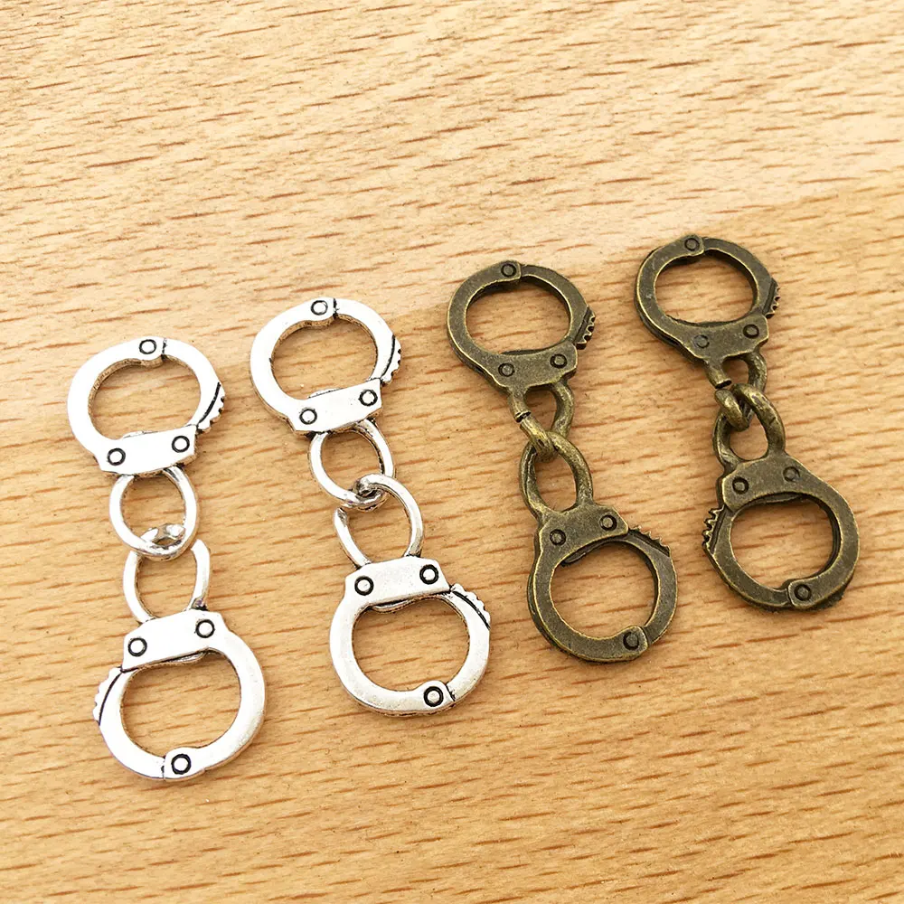 

10 шт./лот Подвеска из цинкового сплава в форме антикварных бронзовых наручников и подвесок для изготовления ожерелья браслета ювелирных из...