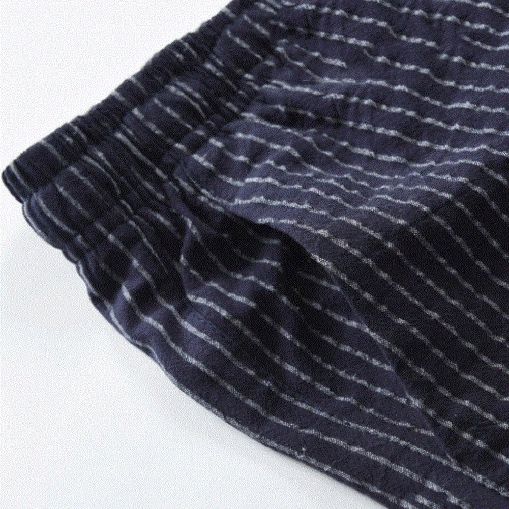 

Men Solid Color Pockets Drawstring Elastic Sports Shorts Cotton Homewear Pants