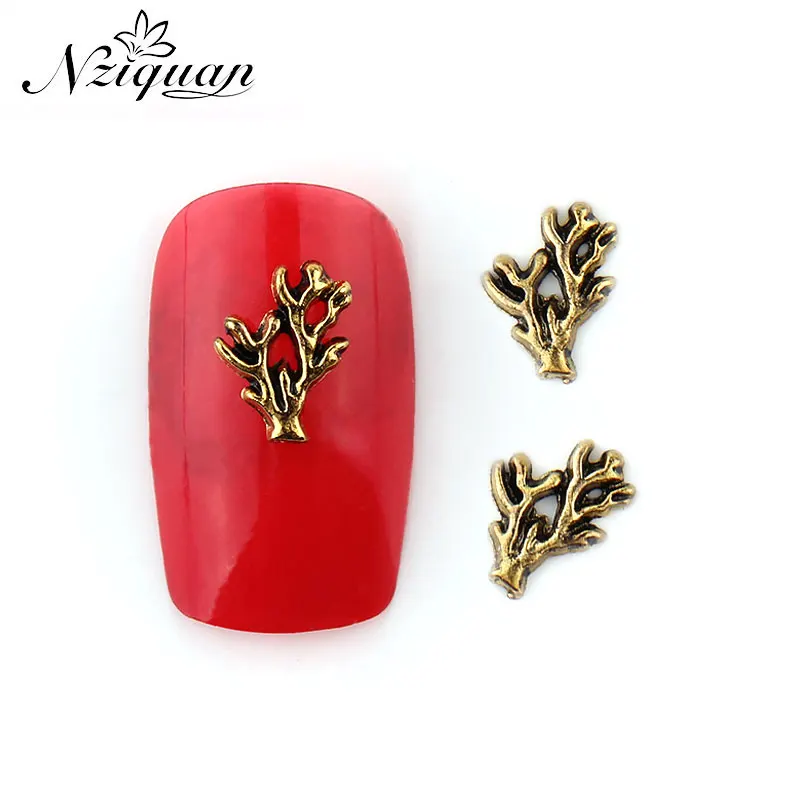 

New product 6*8mmNZIQUAN 20 pieces 3D graphics bronze metal antler nail art decoration DIY accessories nail drill decoration