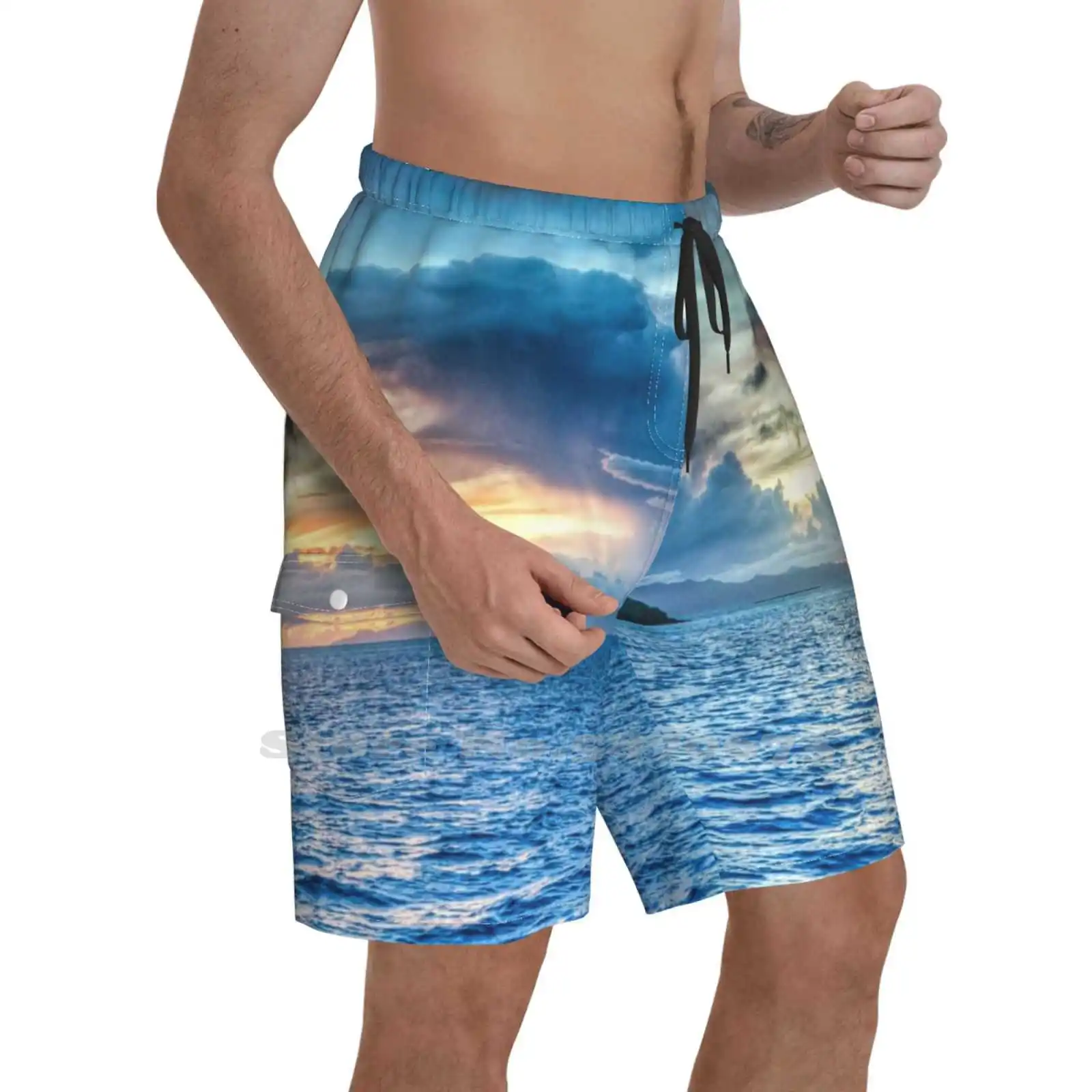 

Dawn Breaking Over The Sea Men'S Summer Short Pants Beach Shorts Sea Ocean Sunrise Clouds Waves Sky Island Bora Blue Huts Fire