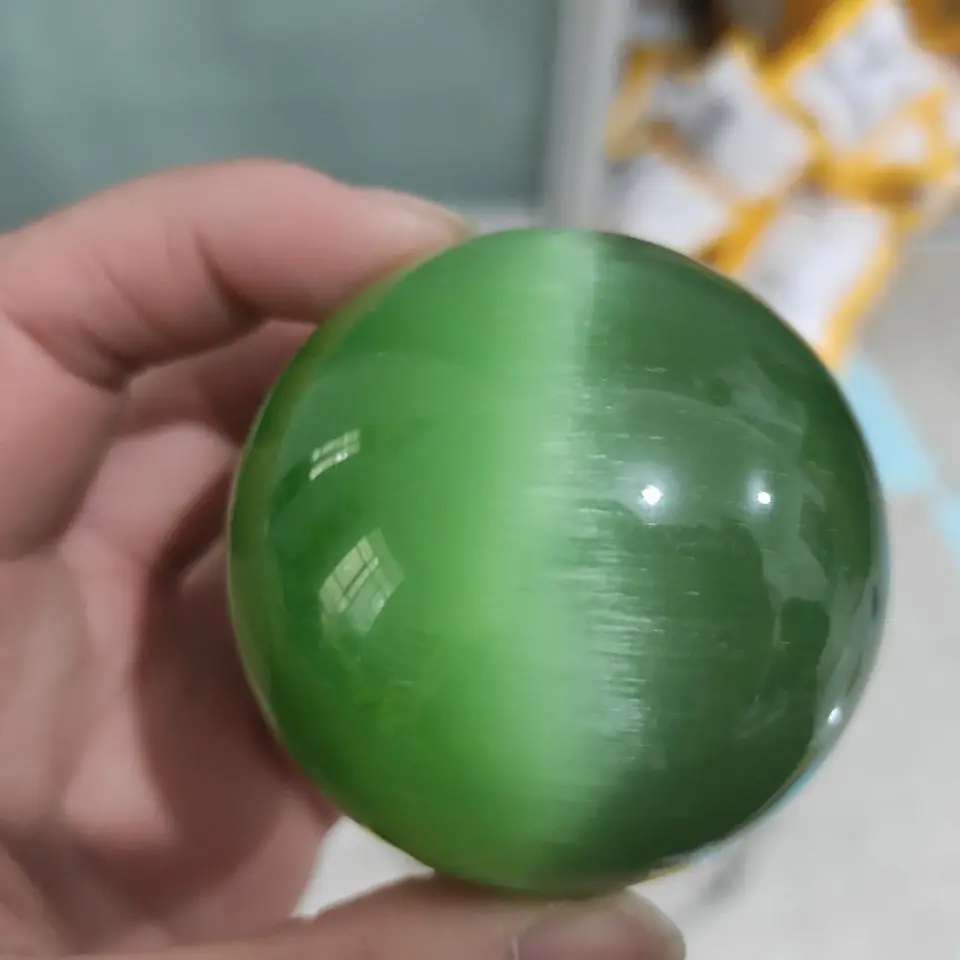 

6cm green quartz cat's eye crystal ball + stand