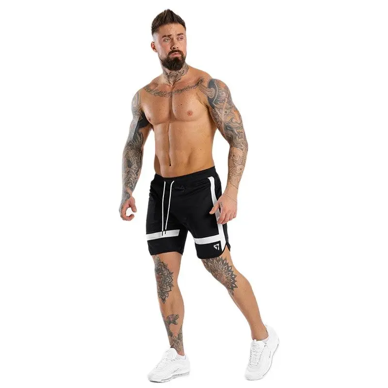

2021 new men's casual sports shorts summer and autumn stitching solid color men's casual running training fitness shortsM-XXL